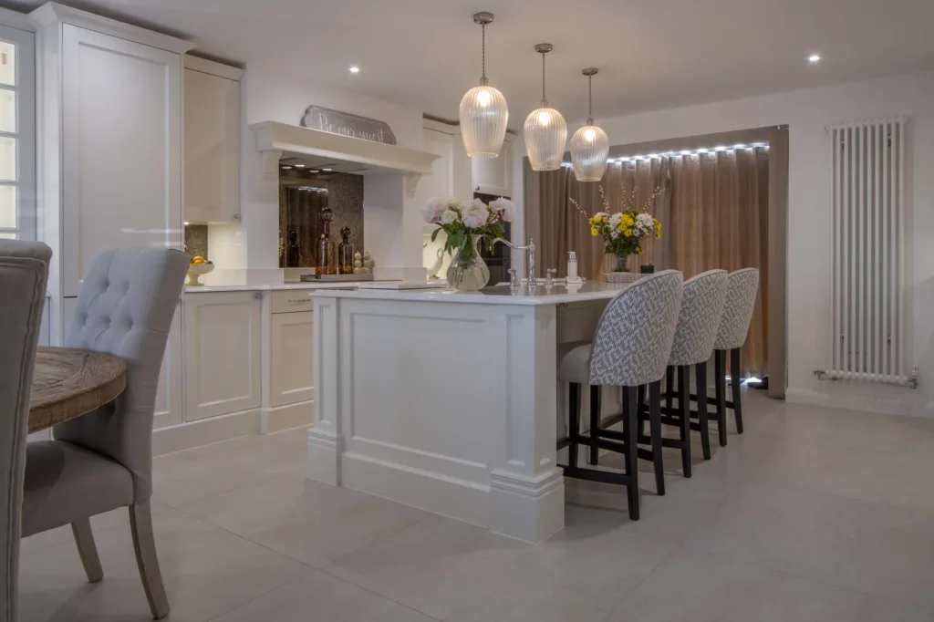 Cream classic kitchen viewed from the dining area